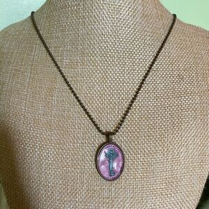 Whimsical pink and blue key pendant necklace